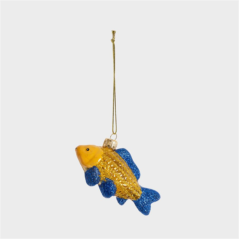 Decorative fish ornament with gold and blue glitter on a white background