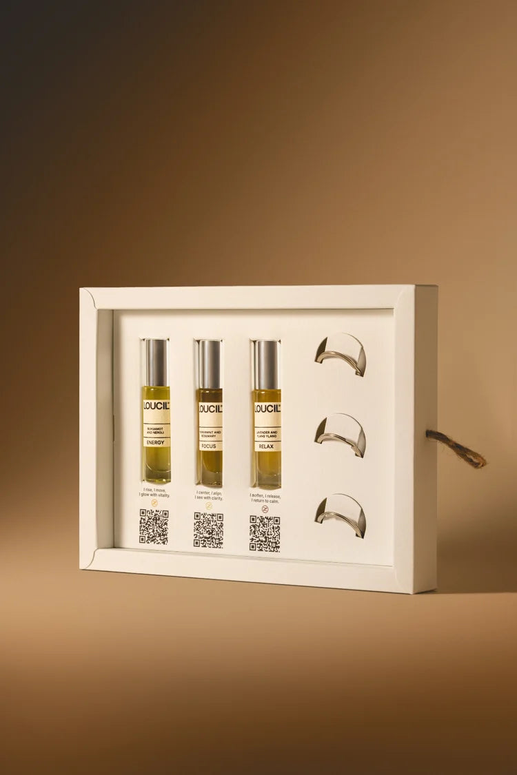 LOUCIL Full Mood Bundle showcasing 3 fragrances in a white gift box on a beige/brown background 