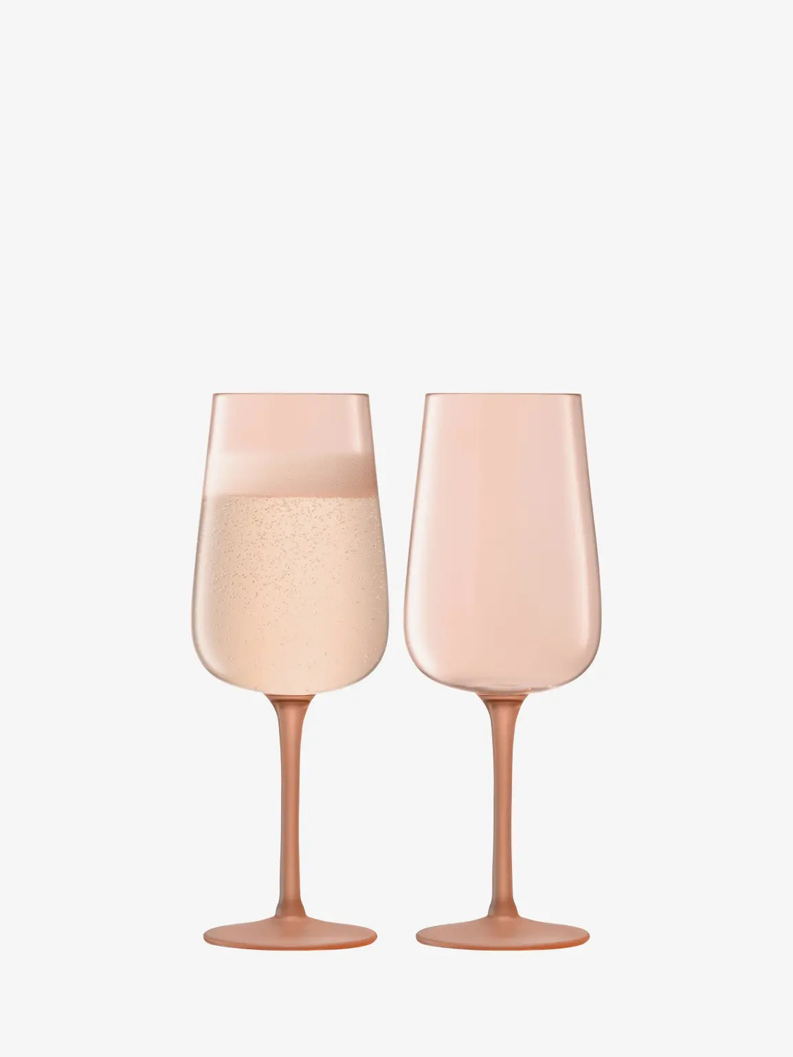 Two pink wine glasses on a white background