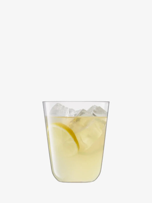 LSA Arc tumbler glass of lemonade with ice cubes on a white background