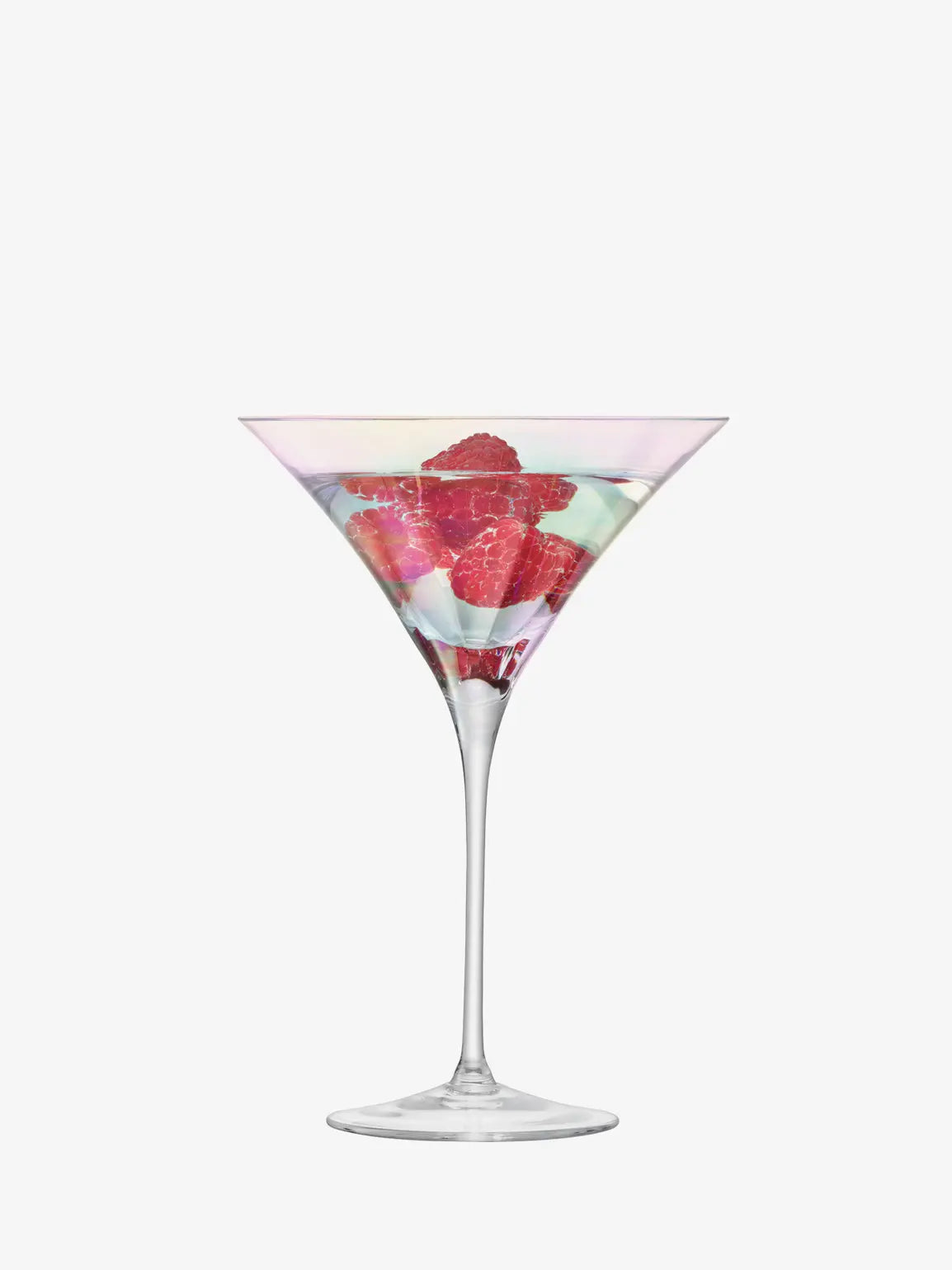 Martini glass with red berries on a white background