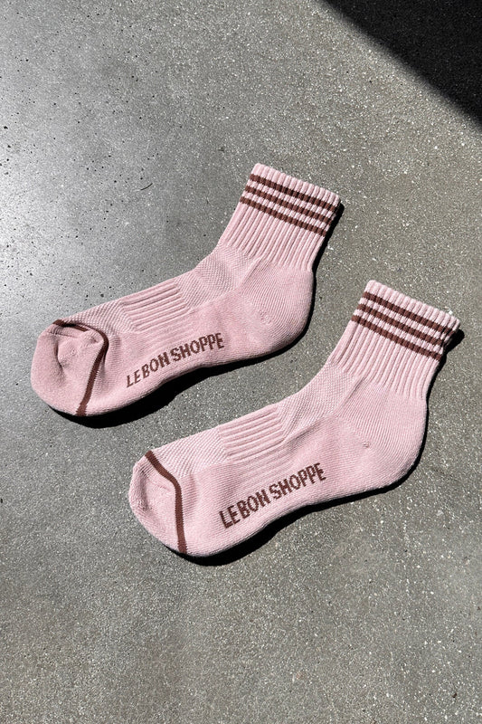 Le Bon Shoppe Girlfriend Socks in Bellini a baby pink colour with brown stripes.