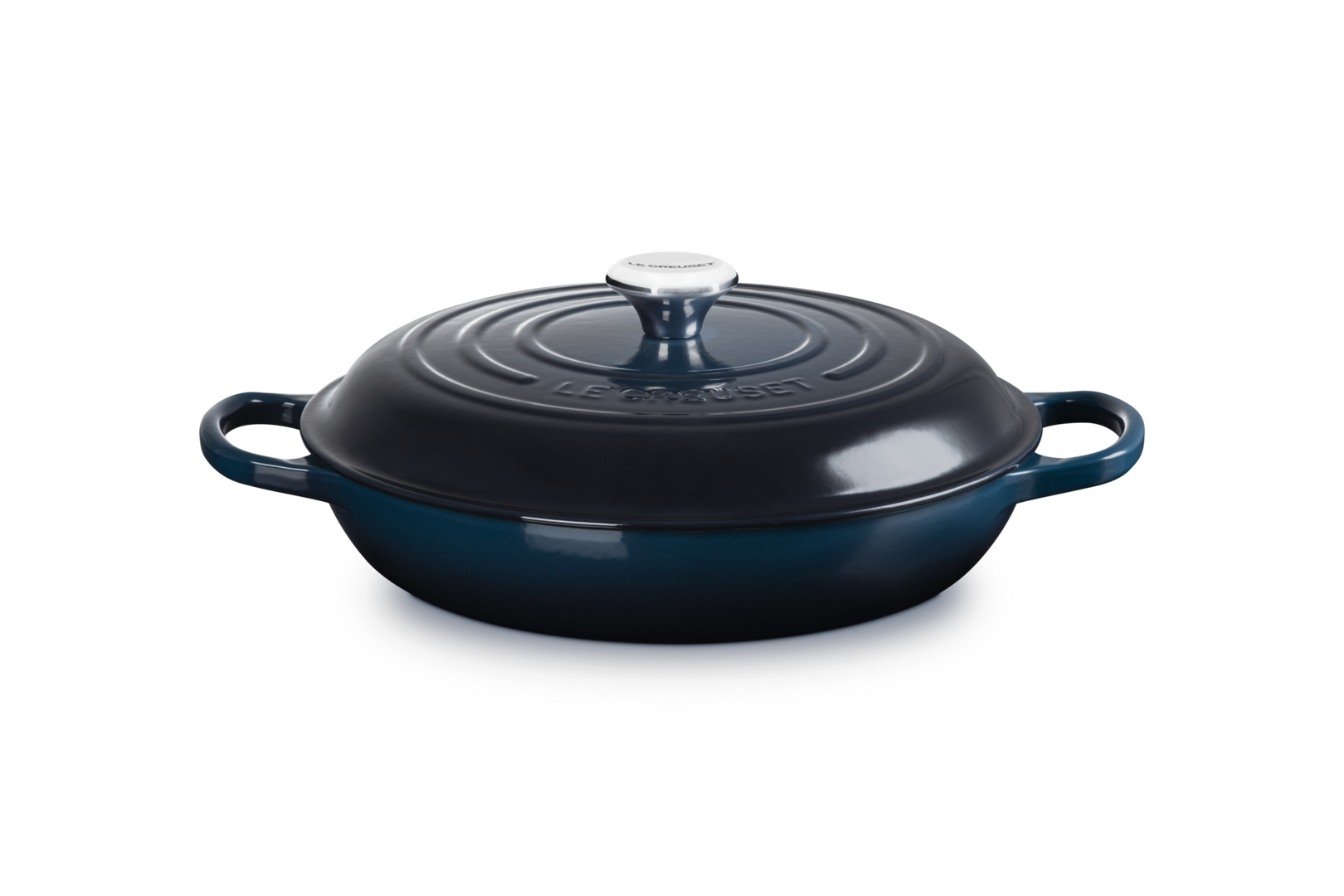 Blue cast iron skillet with lid on a white background
