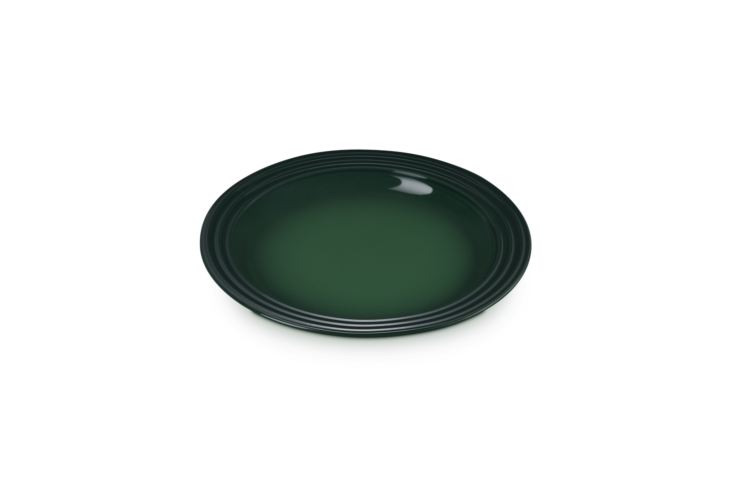 Green ceramic plate on a white background