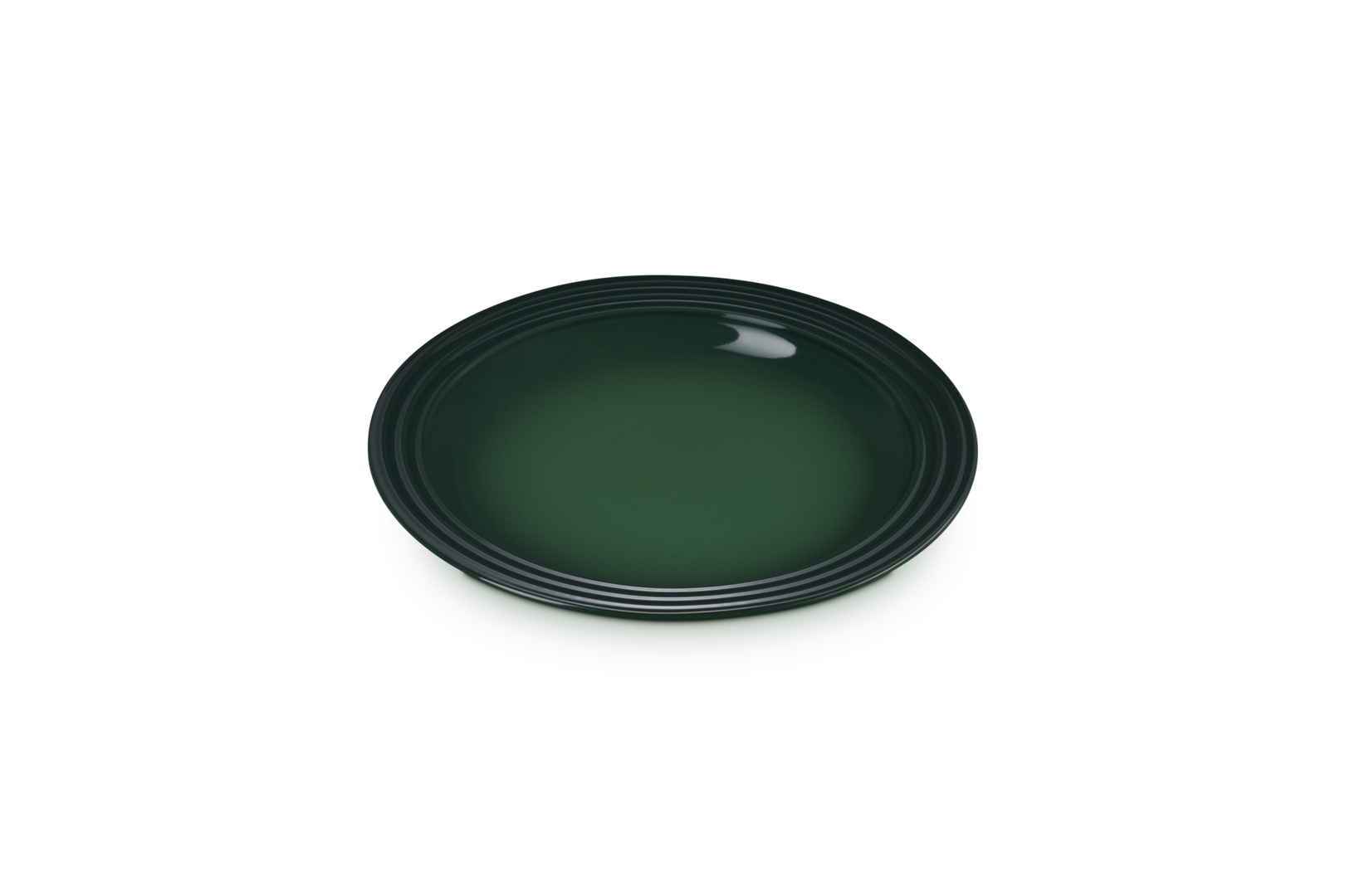 Green ceramic plate on a white background