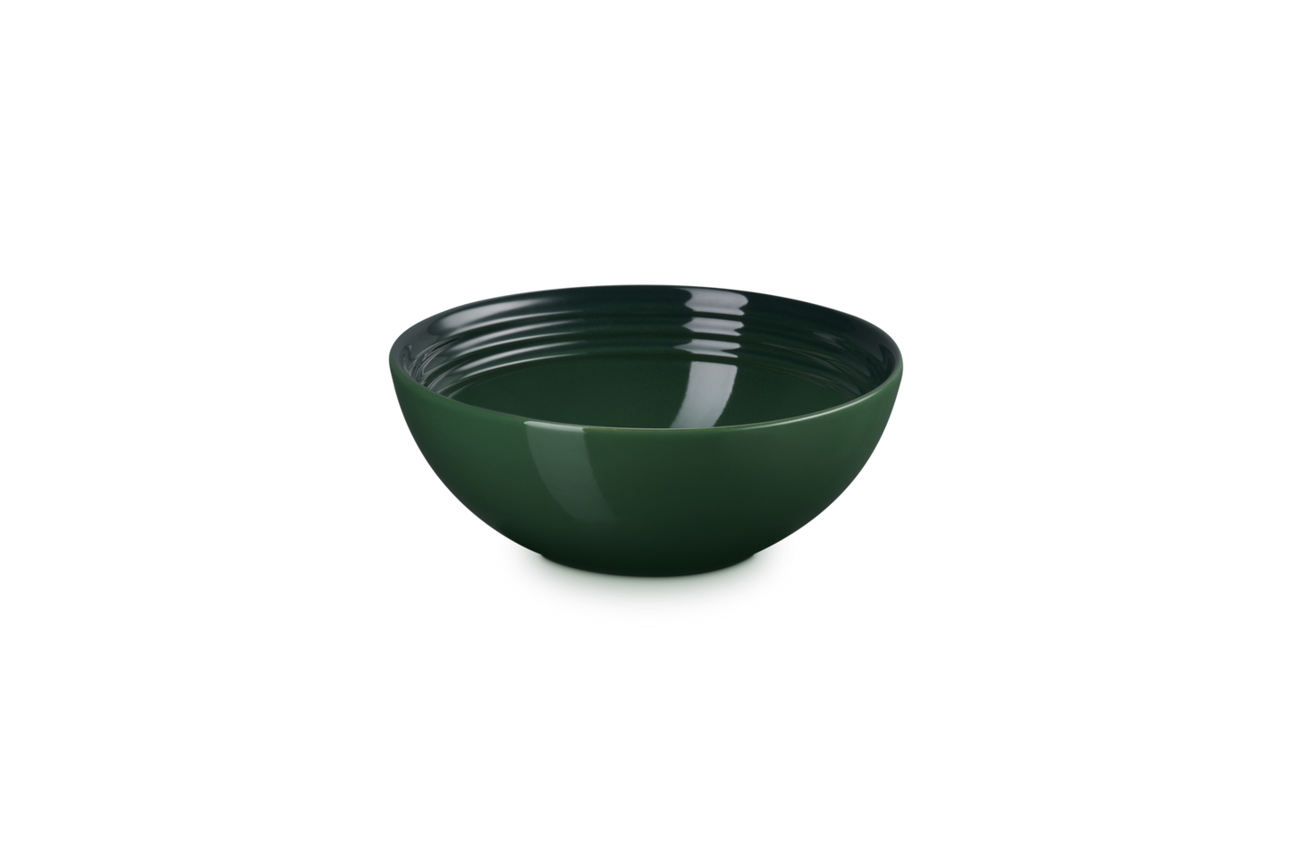 Green ceramic bowl on a white background