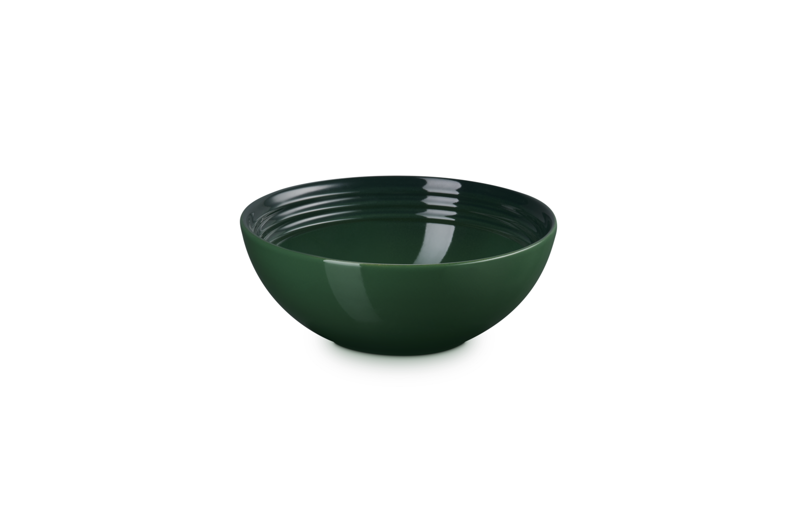 Green ceramic bowl on a white background