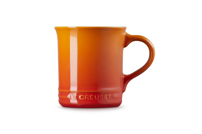 Le Creuset mug with a gradient orange to red color on a white background
