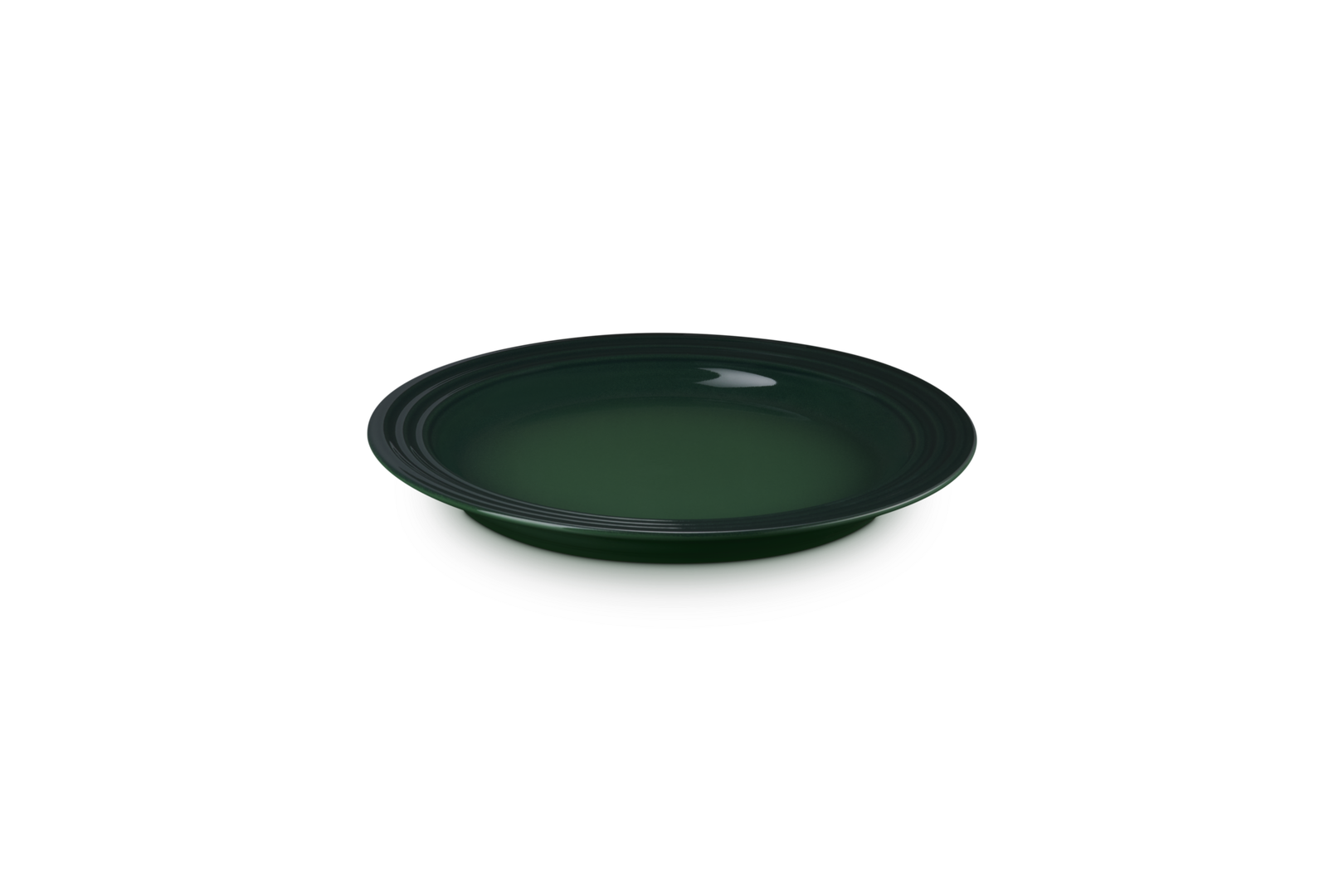 Green ceramic plate on a white background