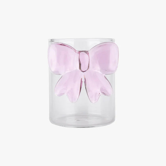 Clear glass candle holder with a pink butterfly decoration on a white background