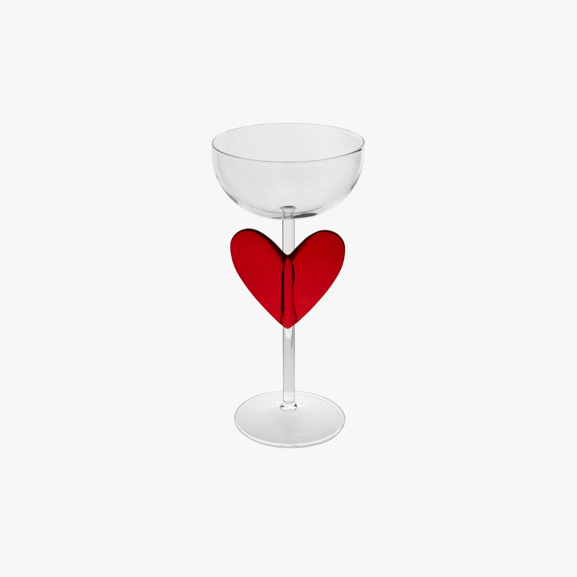Clear glass with a red heart-shaped accent on a white background