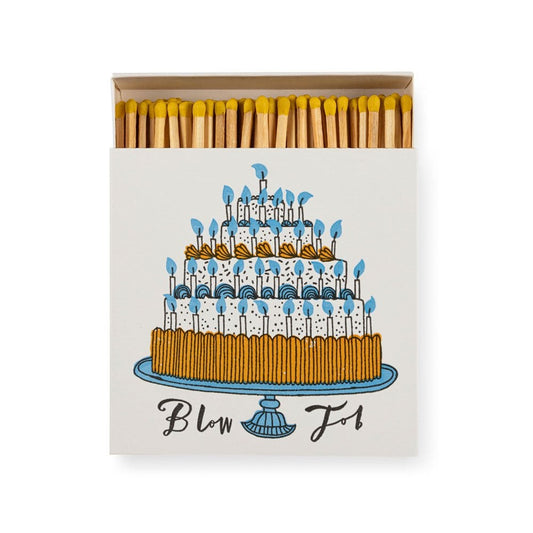 Matches with a cake illustration and 'Blow Out!' text on a white background