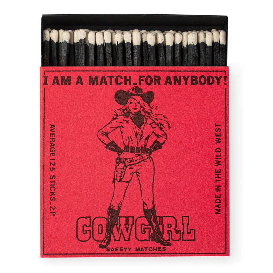 Pack of matches in a red box with cowgirl illustration 