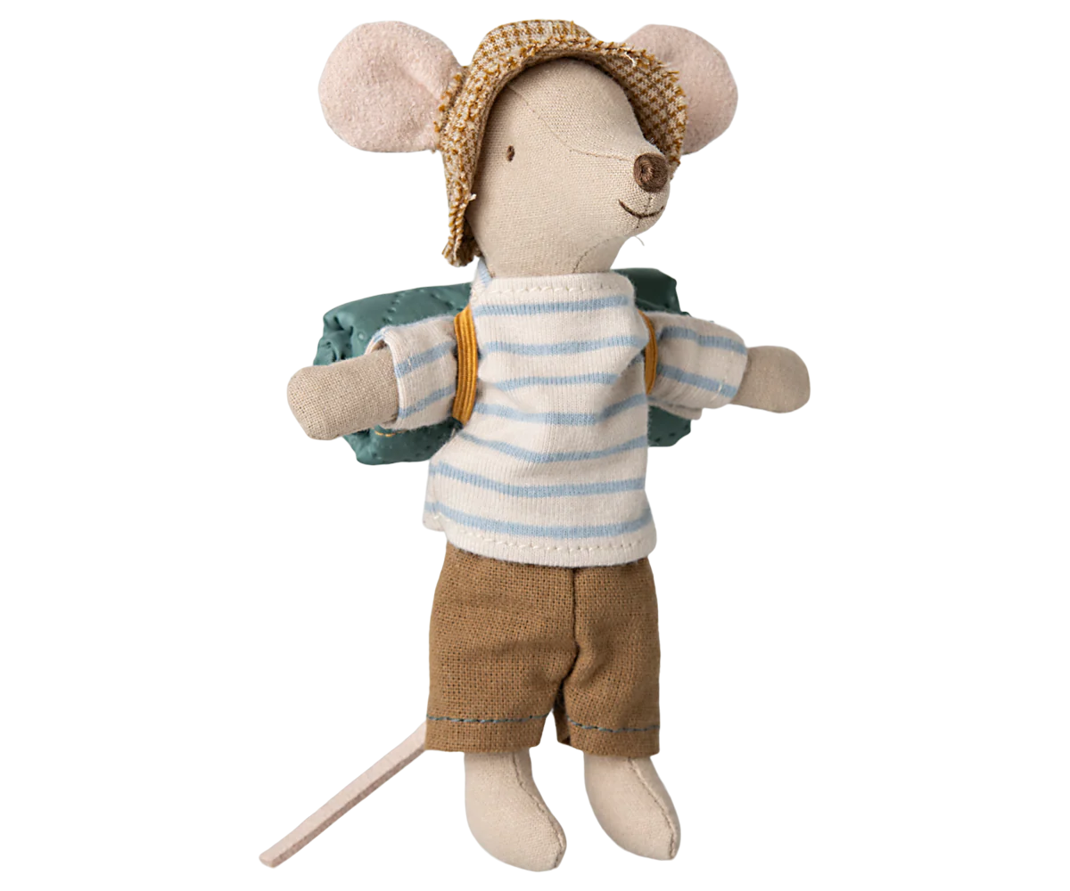 Toy mouse dressed in a striped shirt, shorts, and hat on a white background