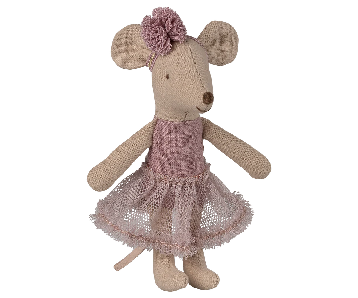 Stuffed mouse toy with a pink dress and flower headband on a white background