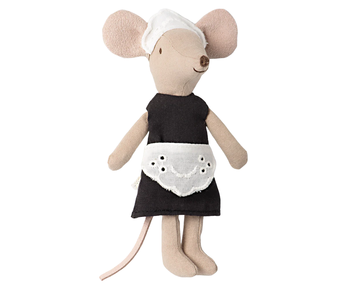 Stuffed mouse toy wearing a black dress with white apron on a white background