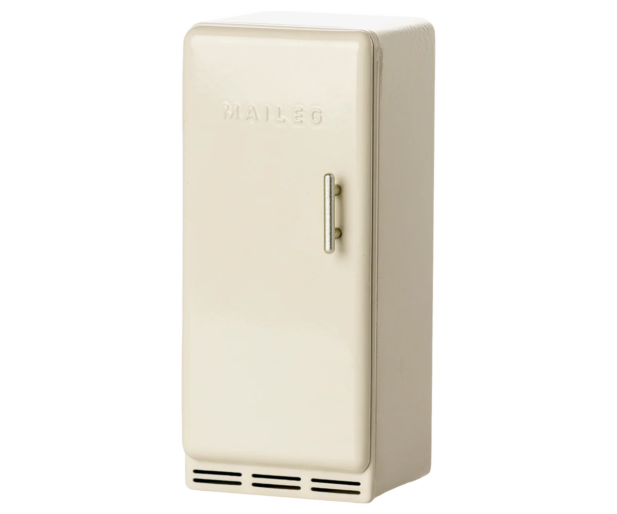 Vintage-style toy beige refrigerator from maileg on a white background