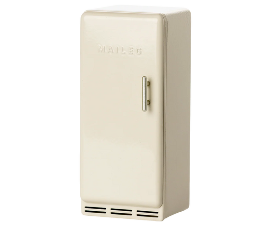 Vintage-style toy beige refrigerator from maileg on a white background