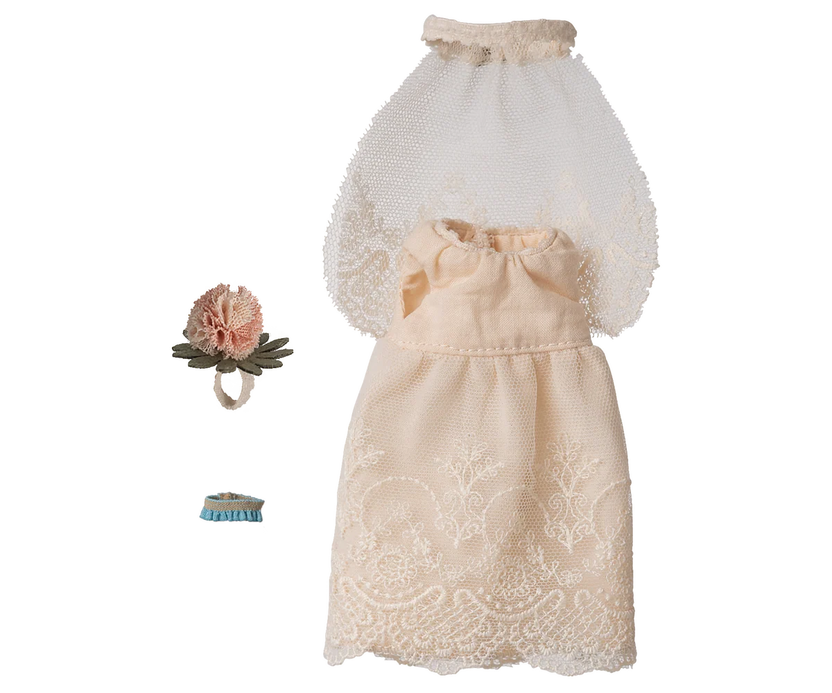 A miniature ivory lace dress with a matching veil and a small pink flower accessory, displayed on a clean white background.