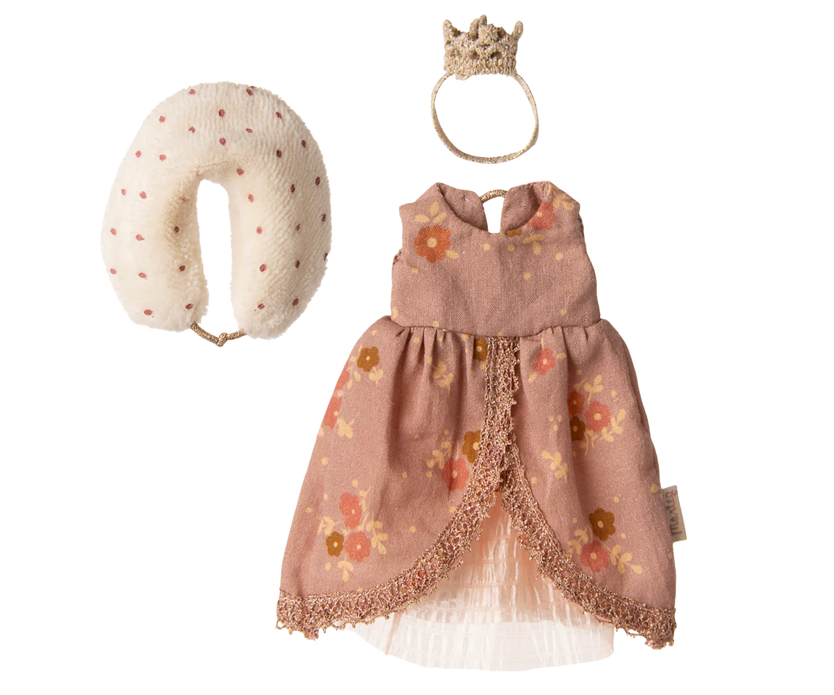 Maileg mouse dress with floral pattern, white headband, and beige pillow on a white background