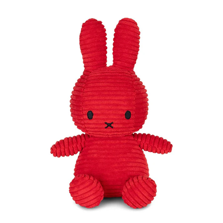 Red plush bunny toy on a white background