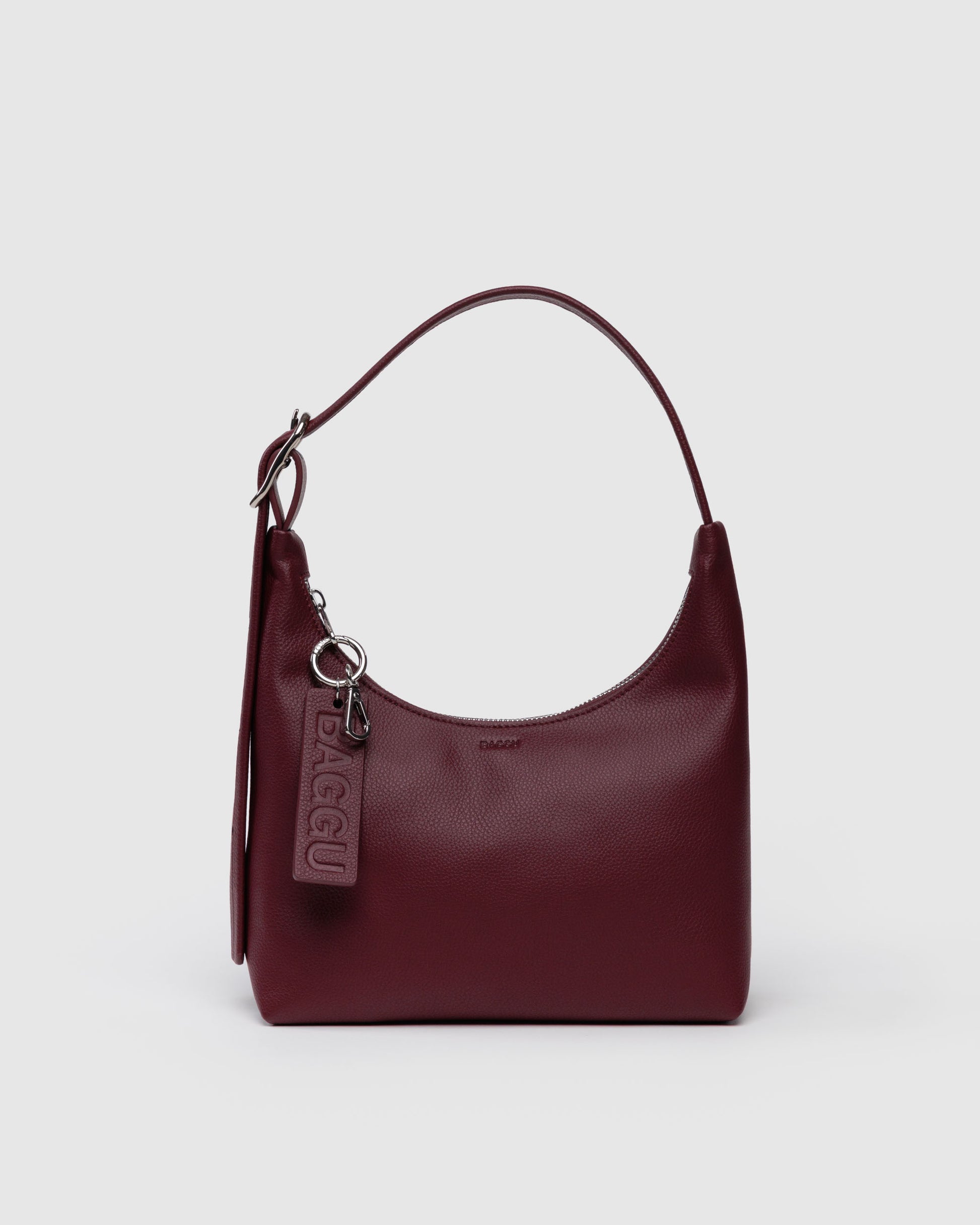 Burgundy handbag with a visible brand logo on a light gray background