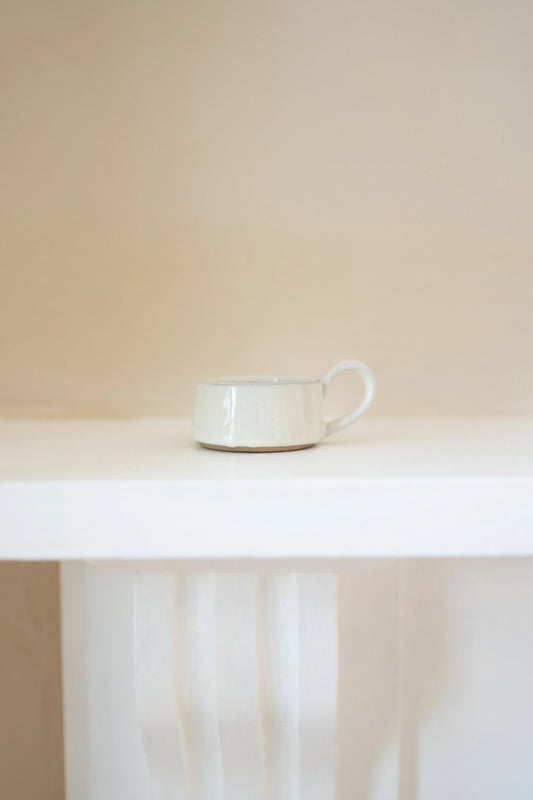 Morgan Wright Stoneware Tea Light Cup in Milk White colours on beige background 