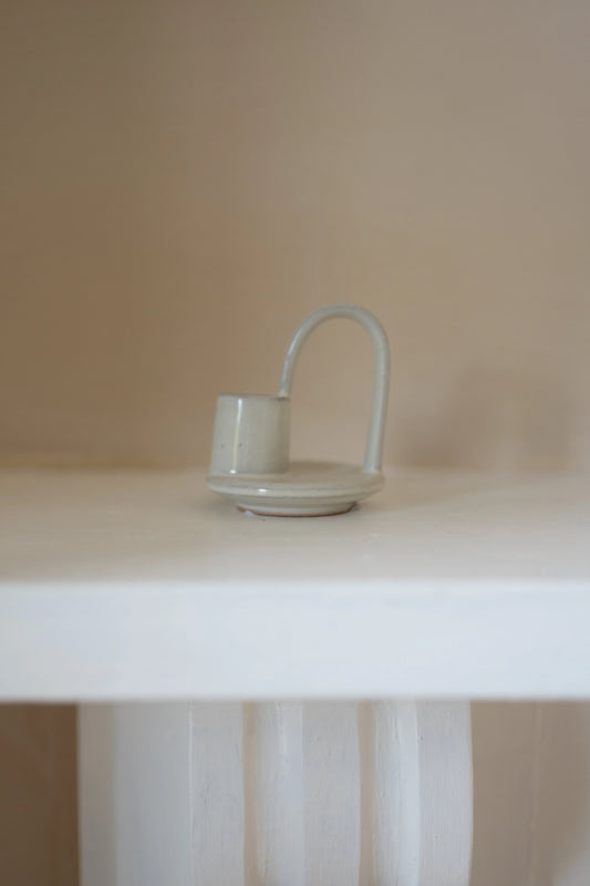 Morgan Wright Wee Willy Winkee Candle Holder in Milk White milk white colour on a beige background 