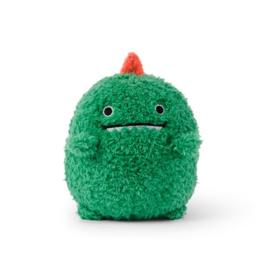 Green plush toy with a small red horn on a white background