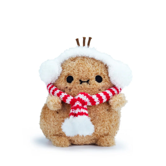 A small plush toy with a curly tan-brown body, wearing a fluffy white hat with three brown tufts and a red-and-white striped knit scarf, photographed on a clean white background.