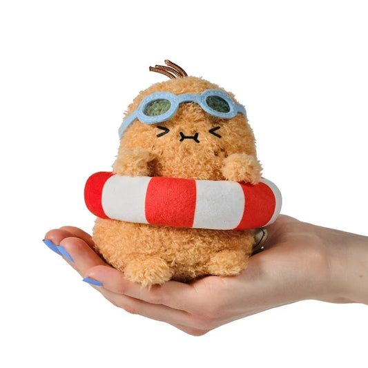 Plush toy resembling a potato with goggles and a life preserver held in a hand on a white background