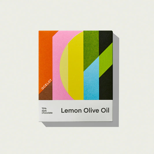 Ocelot Lemon Olive Oil Organic 70% Dark Chocolate Bar in multicolour stripes on a white background 