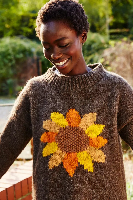 Pachamama Sunflower grey wool sweater with  a large sunflower in the middle 