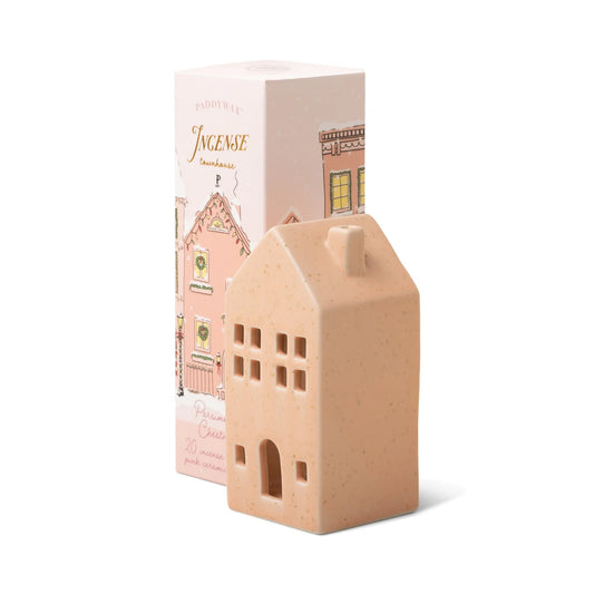 House-shaped ceramic incense burner with packaging on a white background