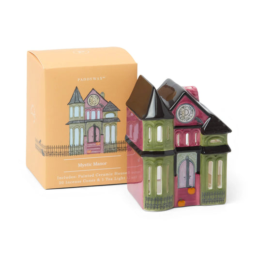 Ceramic house with packaging on a white background