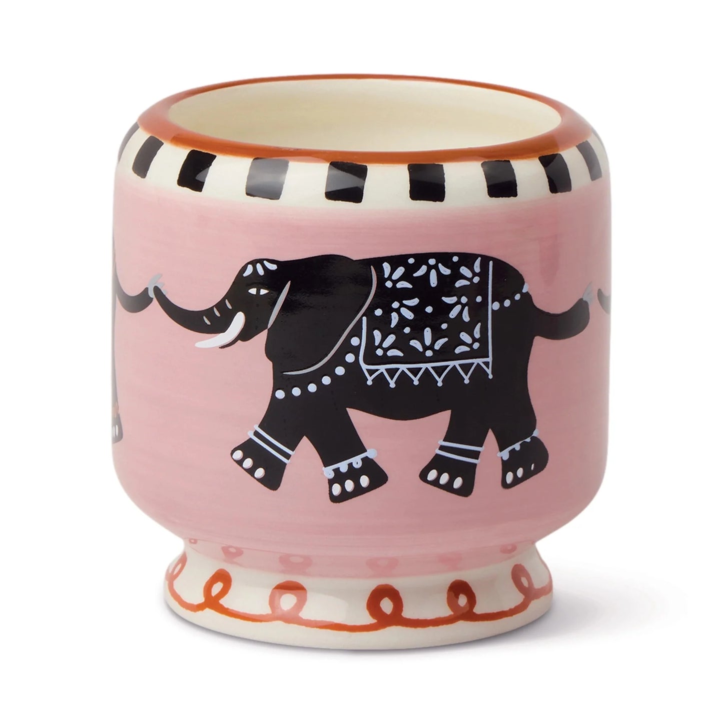 Ceramic candle with elephant design on white background.
