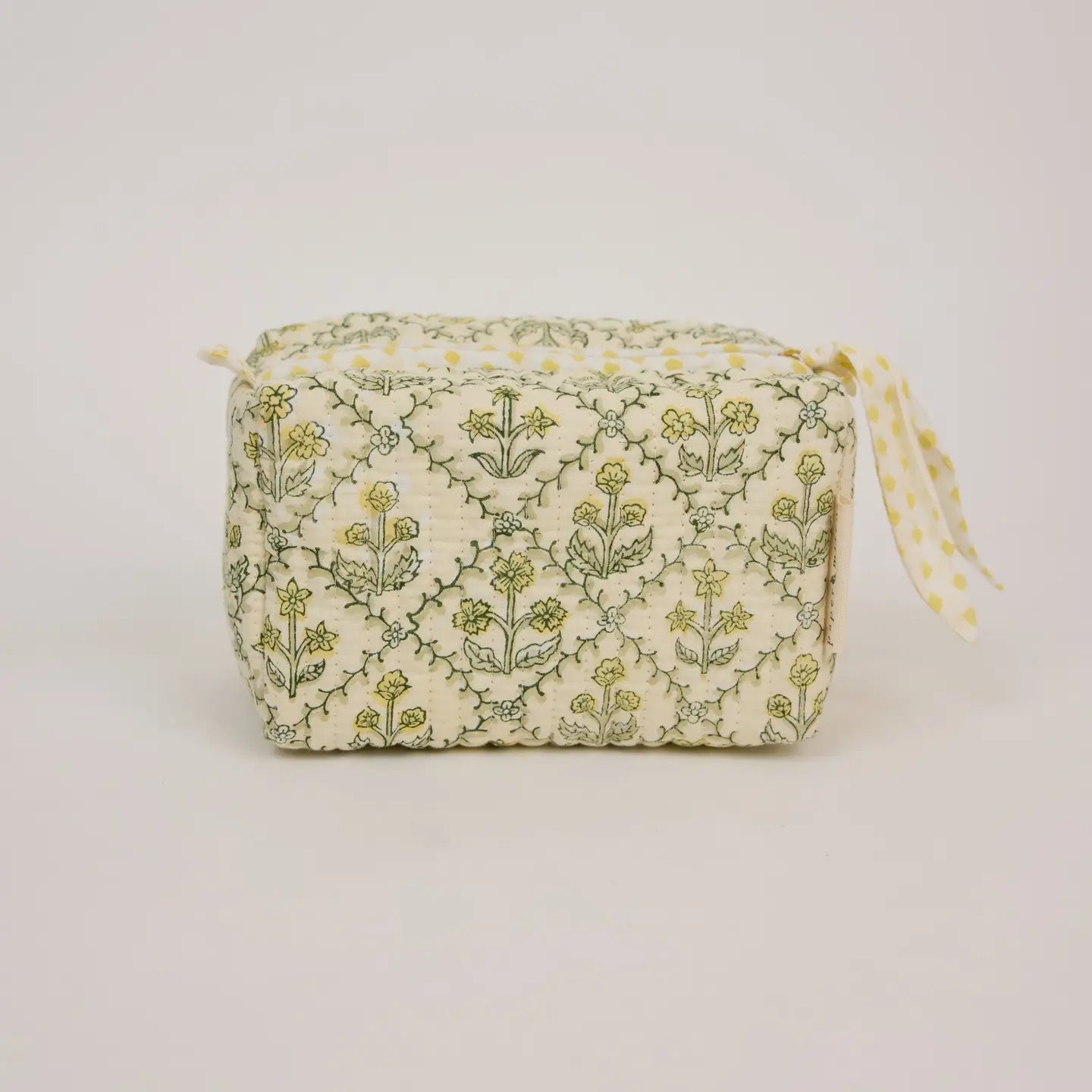 Rectangular pouch with floral pattern on a light background