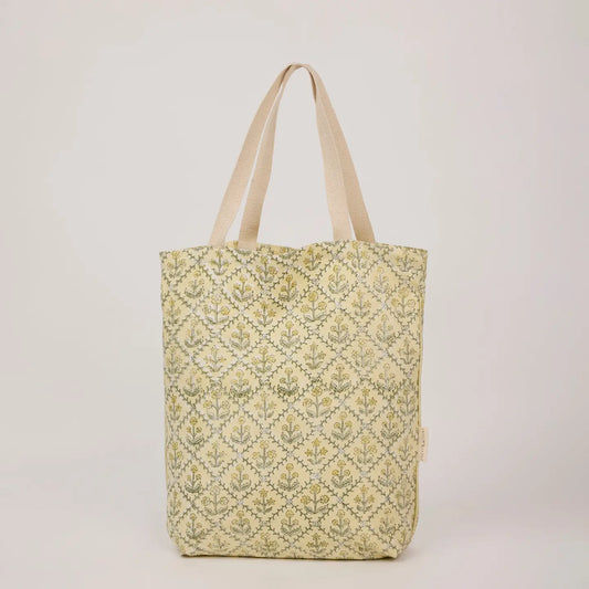 Tote bag with floral pattern on a light background