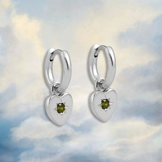 junk jewels periodt heart charm earrings in silver 