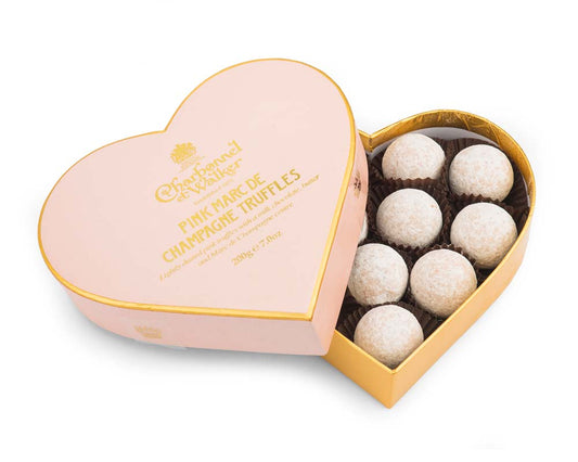 Charbonnel et Walker truffles in a Pink Marc De Champagne Truffles Pink Heart on a white background 