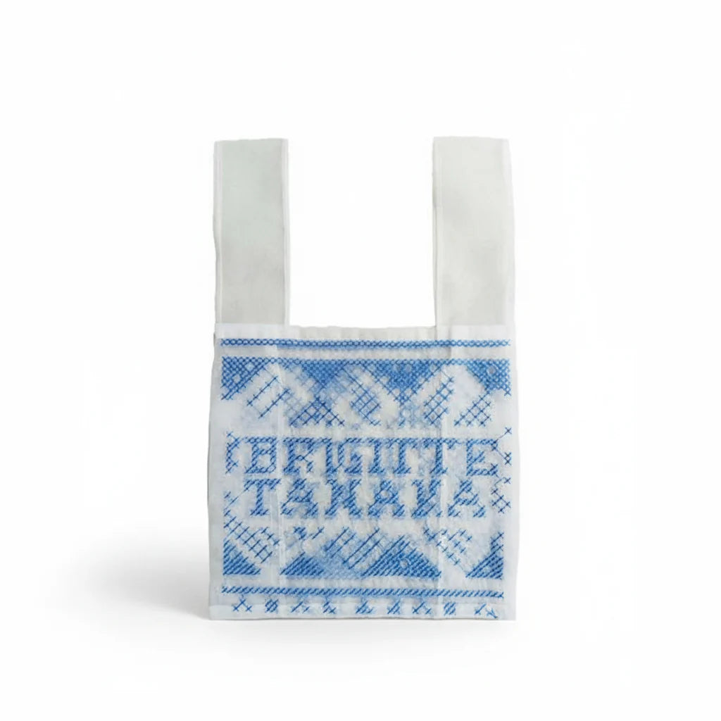 Brigitte Tanaka Point Croix Blue Mesh Organza Bag on a white background 