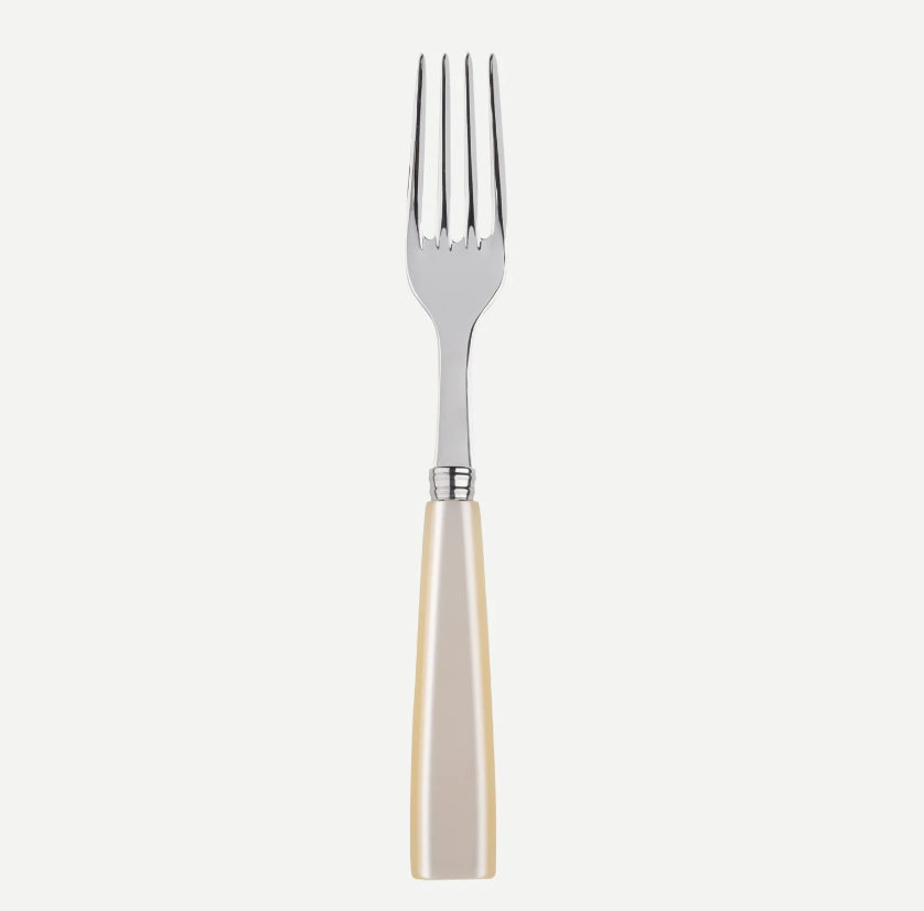 A single dinner fork with a polished silver-toned metal head and a smooth, cream-colored handle, centered against a solid off-white background.