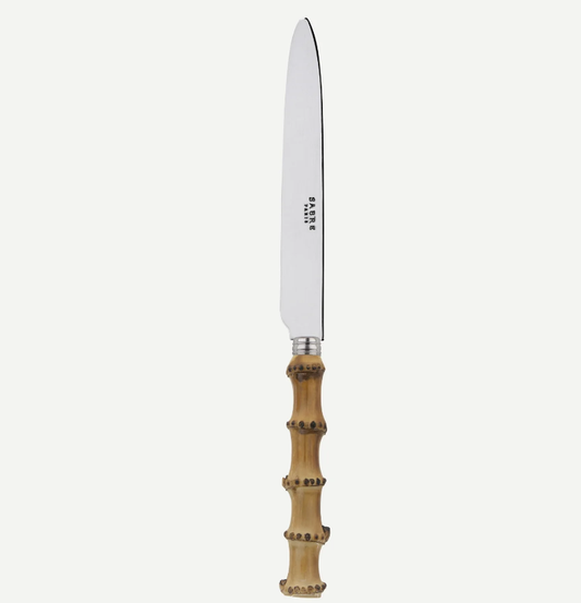 SABRE Paris dinner knife with a bamboo handle on a white background 