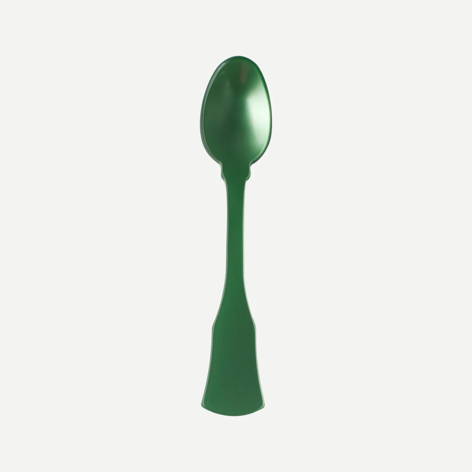 Green spoon on a white background