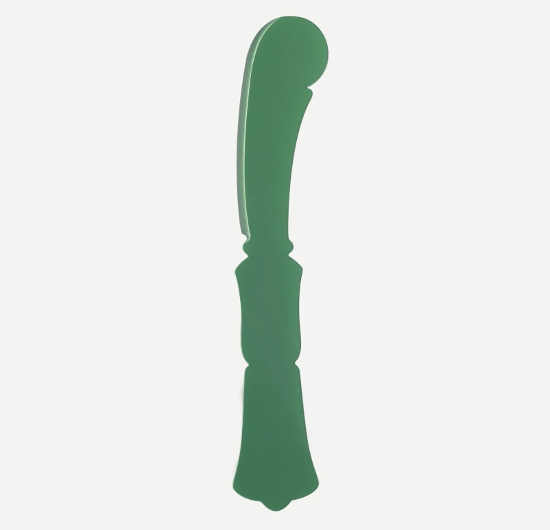 A single green curved butter spreadeer from SABRE Paris on a white background 