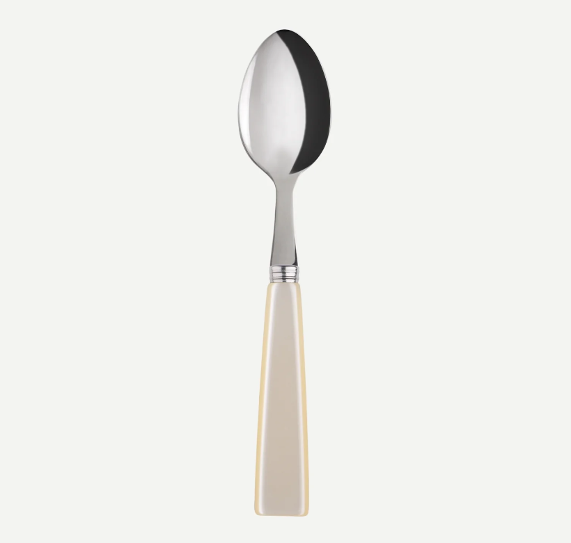 A single stainless steel spoon shown vertically against a plain white background.