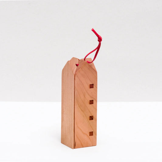 Wooden House trivet on white background