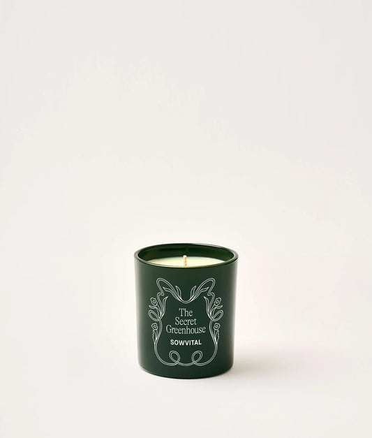 SOWVITAL Scented Candle in deep green glass jar on a white background
