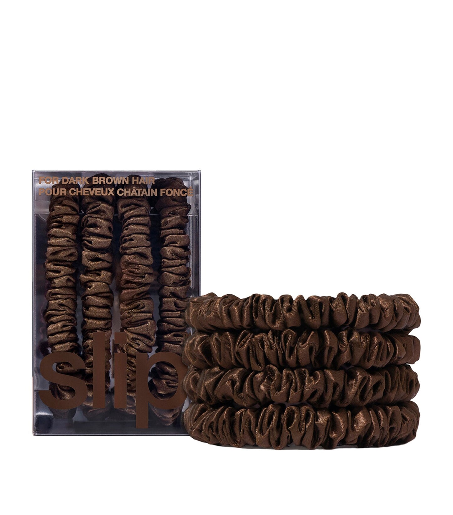 Set of dark brown hair ties with packaging on a white background