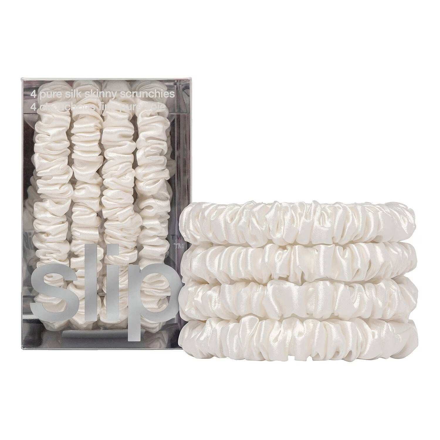 Packaged set of white hair scrunchies with 'slip' branding on a white background
